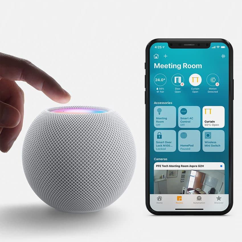 A collection of various smart home devices on a table.